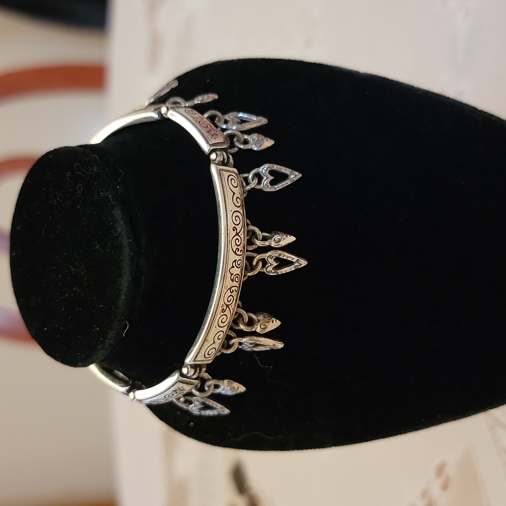 BRIGHTON BRACELET WITH TINY HEARTS ALL ALONG THE BOTTOM 7.5" LONG Retired piece
